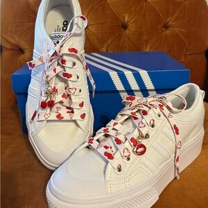 Adidas Women's White Sneakers with Red Heart Accents